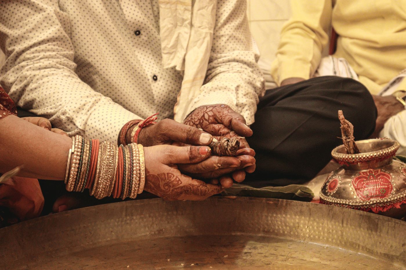 Hands during a wedding ritual
