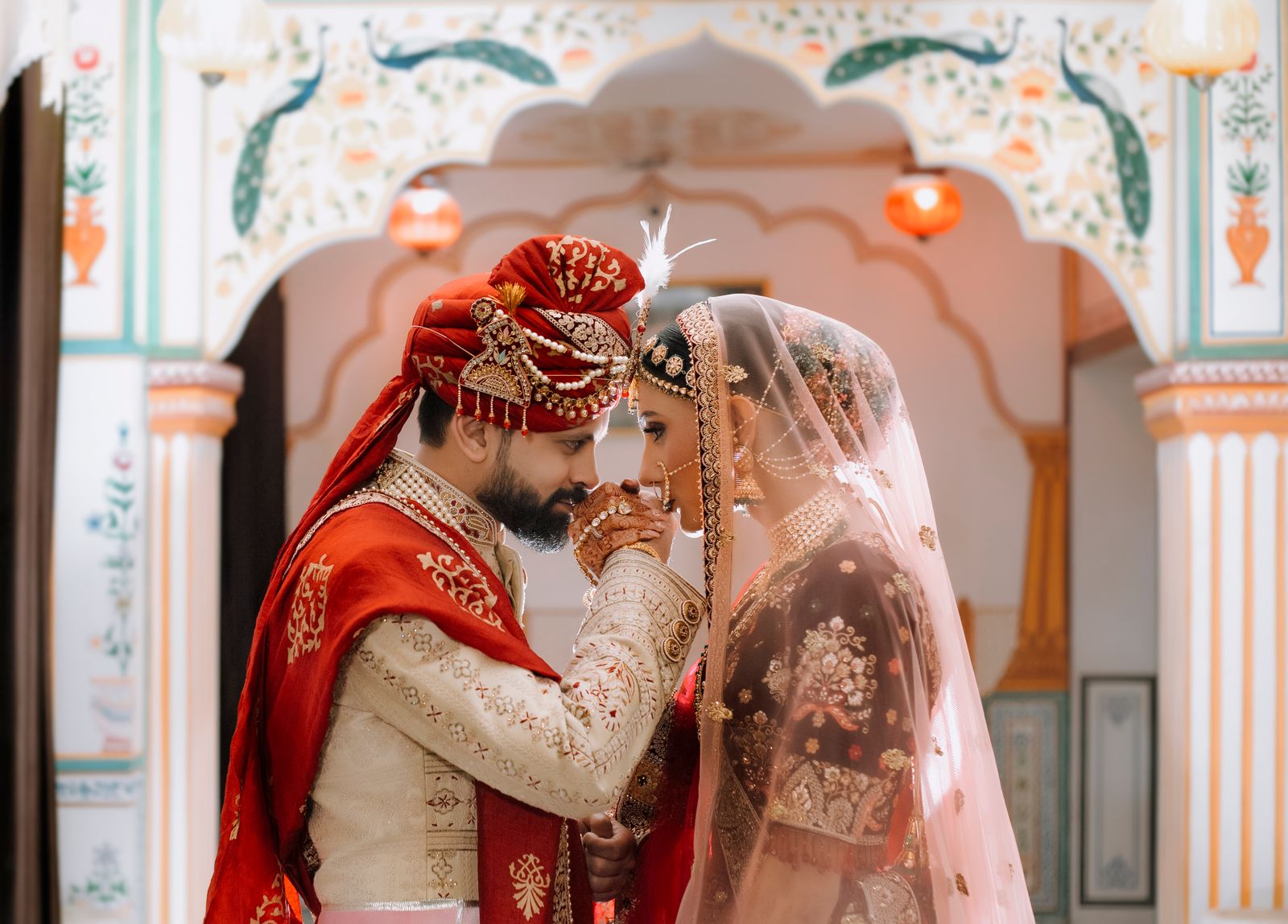 A couple beneath a painted palace archway